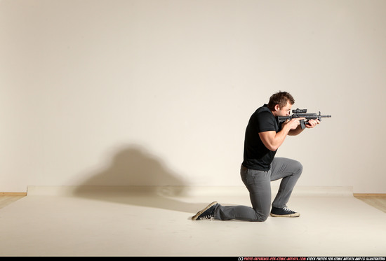 Man Adult Muscular White Fighting with submachine gun Moving poses Casual