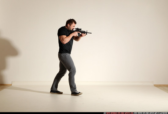 Man Adult Muscular White Fighting with submachine gun Moving poses Casual