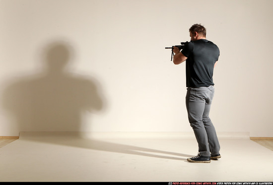 Man Adult Muscular White Fighting with submachine gun Moving poses Casual