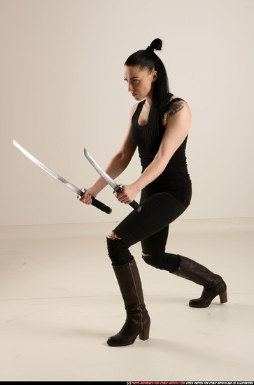 Woman Adult Athletic White Fighting with sword Standing poses Casual