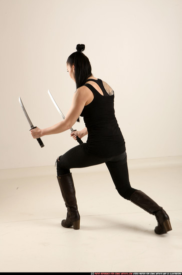 Woman Adult Athletic White Fighting with sword Standing poses Casual