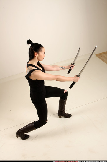 Woman Adult Athletic White Fighting with sword Standing poses Casual