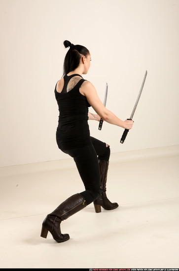 Woman Adult Athletic White Fighting with sword Standing poses Casual