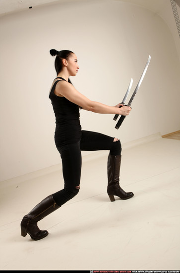 Woman Adult Athletic White Fighting with sword Standing poses Casual