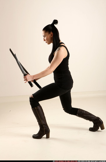 Woman Adult Athletic White Fighting with sword Standing poses Casual