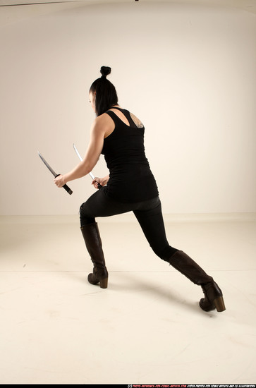 Woman Adult Athletic White Fighting with sword Standing poses Casual