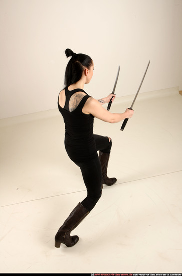 Woman Adult Athletic White Fighting with sword Standing poses Casual