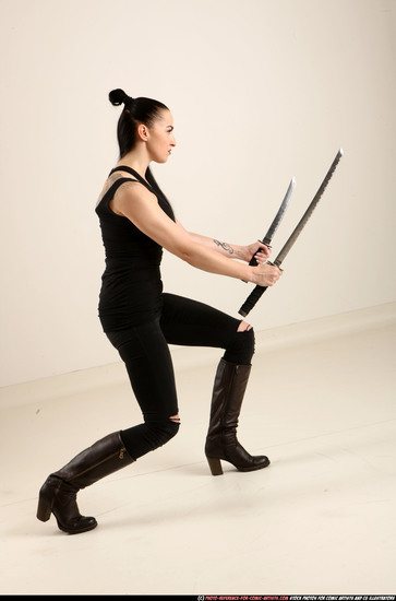 Woman Adult Athletic White Fighting with sword Standing poses Casual