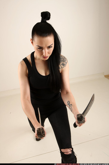 Woman Adult Athletic White Fighting with sword Standing poses Casual