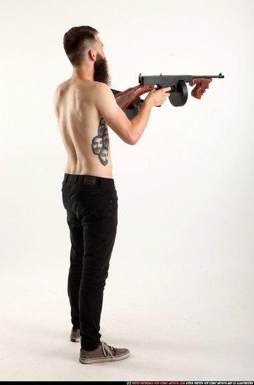 Man Adult Athletic White Fighting with submachine gun Standing poses Pants