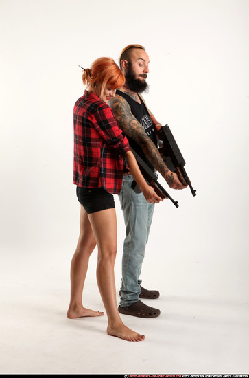 Man & Woman Adult Athletic White Fighting with submachine gun Standing poses Casual