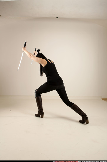 Woman Adult Athletic White Fighting with sword Standing poses Casual