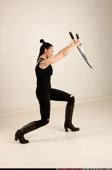 Woman Adult Athletic White Fighting with sword Standing poses Casual