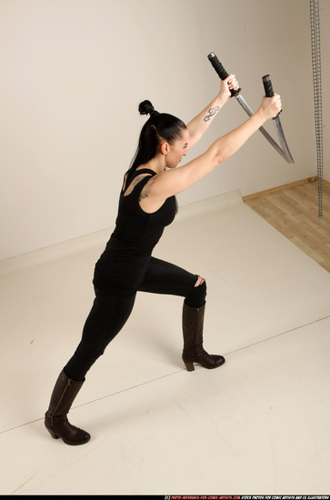 Woman Adult Athletic White Fighting with sword Standing poses Casual