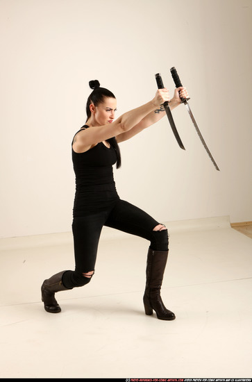 Woman Adult Athletic White Fighting with sword Standing poses Casual