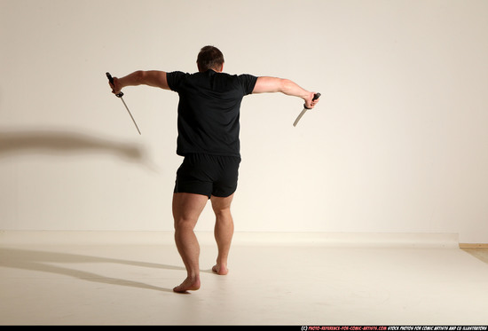 Man Adult Muscular White Fighting with sword Moving poses Sportswear