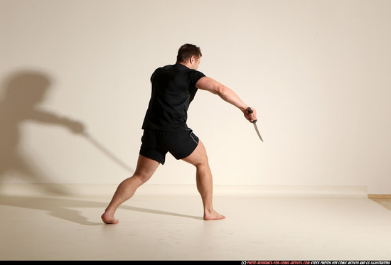 Man Adult Muscular White Fighting with sword Moving poses Sportswear