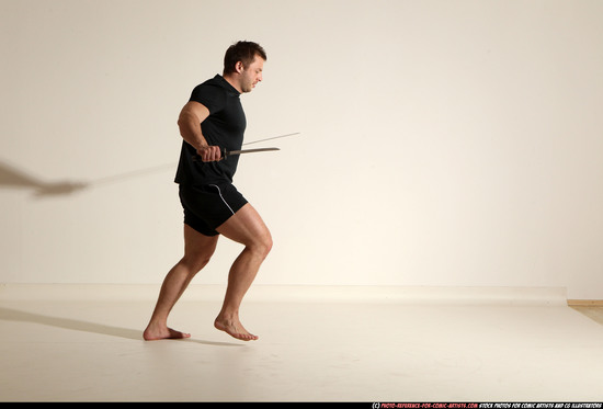 Man Adult Muscular White Fighting with sword Moving poses Sportswear