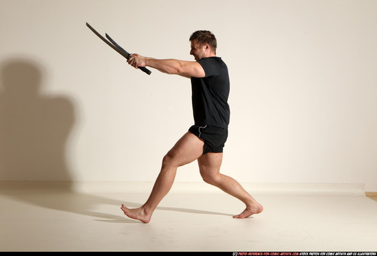 Man Adult Muscular White Fighting with sword Moving poses Sportswear