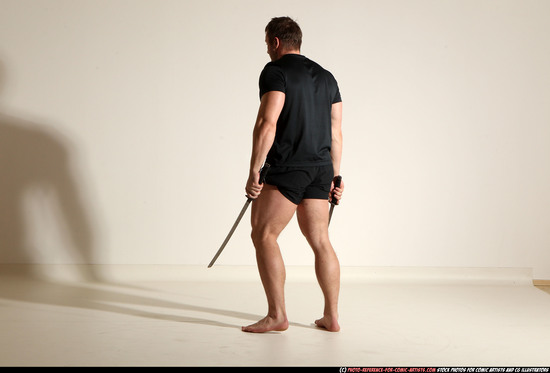 Man Adult Muscular White Fighting with sword Moving poses Sportswear