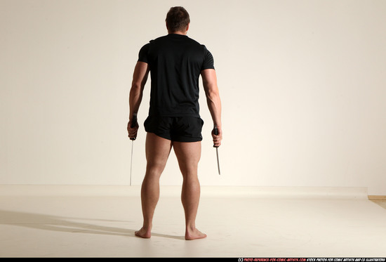 Man Adult Muscular White Fighting with sword Moving poses Sportswear