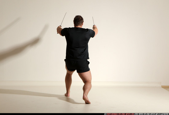 Man Adult Muscular White Fighting with sword Moving poses Sportswear