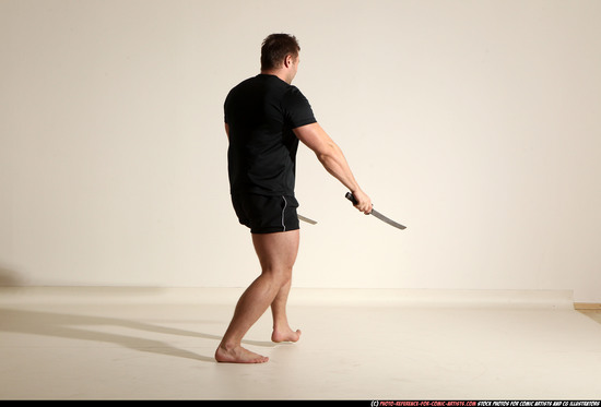 Man Adult Muscular White Fighting with sword Moving poses Sportswear