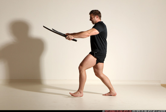 Man Adult Muscular White Fighting with sword Moving poses Sportswear