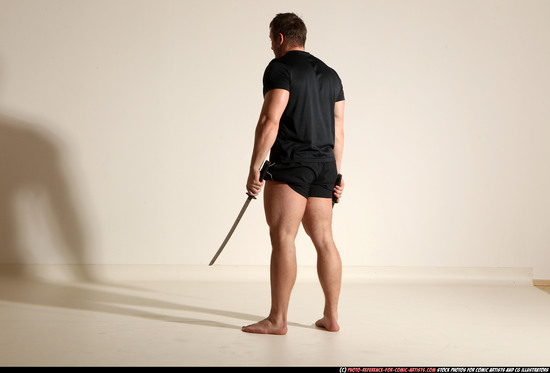 Man Adult Muscular White Fighting with sword Moving poses Sportswear