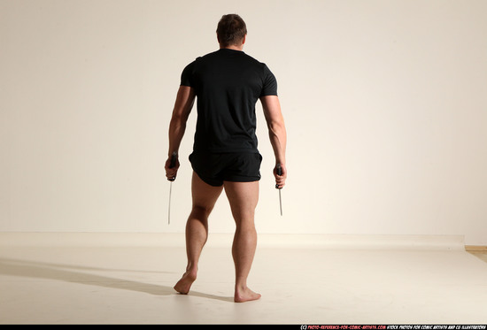 Man Adult Muscular White Fighting with sword Moving poses Sportswear