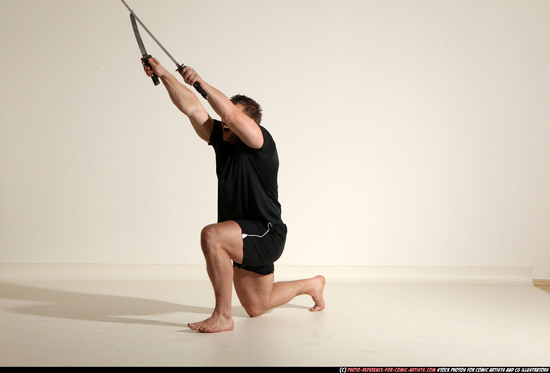 Man Adult Muscular White Fighting with sword Moving poses Sportswear