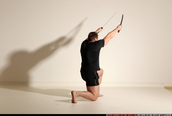 Man Adult Muscular White Fighting with sword Moving poses Sportswear