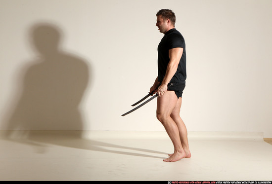 Man Adult Muscular White Fighting with sword Moving poses Sportswear