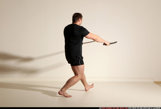 Man Adult Muscular White Fighting with sword Moving poses Sportswear