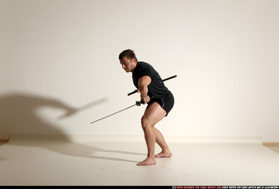 Man Adult Muscular White Fighting with sword Moving poses Sportswear