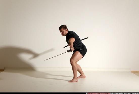 Man Adult Muscular White Fighting with sword Moving poses Sportswear