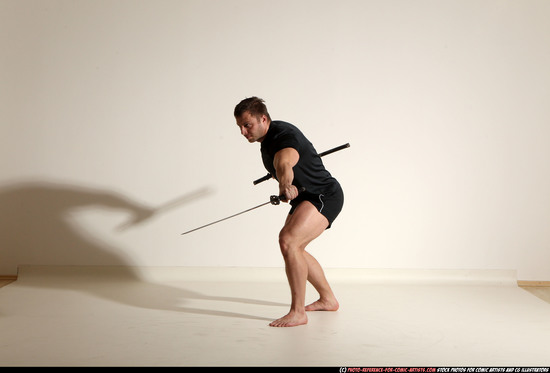 Man Adult Muscular White Fighting with sword Moving poses Sportswear