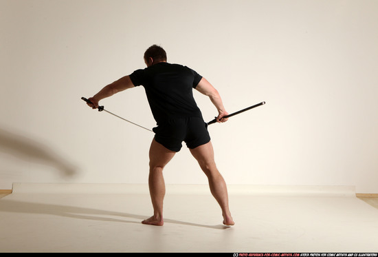 Man Adult Muscular White Fighting with sword Moving poses Sportswear