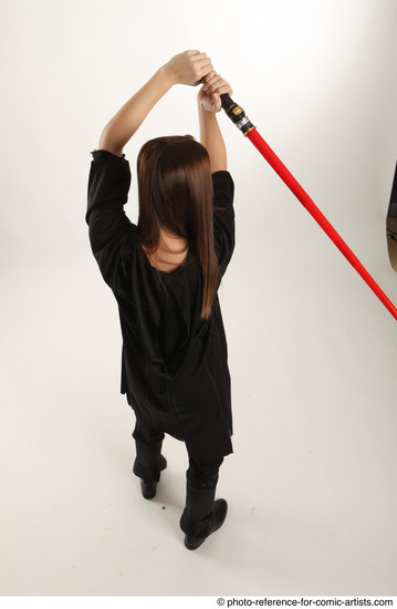 Woman Adult Average White Fighting with sword Standing poses Casual