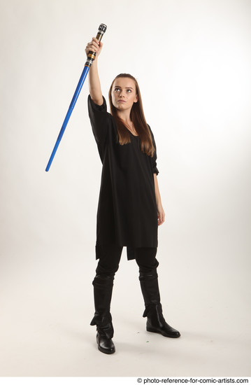 Woman Adult Average White Fighting with sword Standing poses Coat