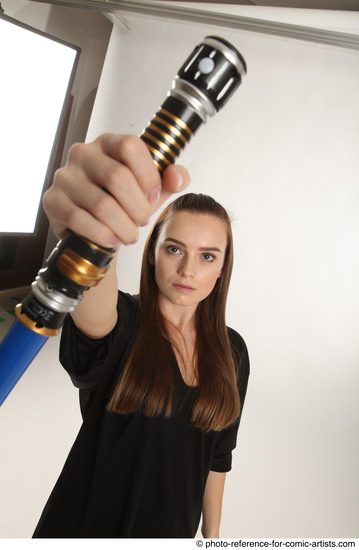 Woman Adult Average White Fighting with sword Standing poses Coat