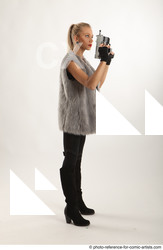 Man Adult Average White Fighting with gun Standing poses Coat