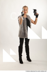 Man Adult Average White Fighting with gun Standing poses Coat