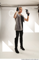 Man Adult Average White Fighting with gun Standing poses Coat