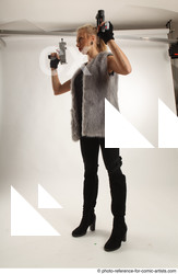 Man Adult Average White Fighting with gun Standing poses Coat