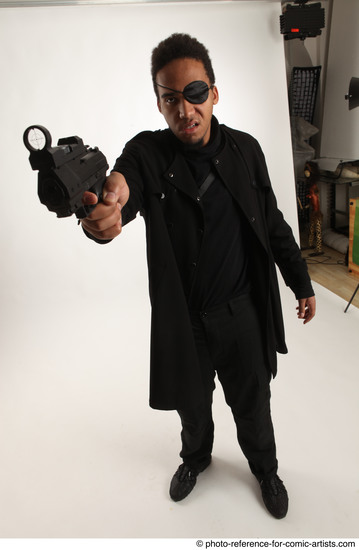 Man Adult Average Black Fighting with gun Standing poses Coat