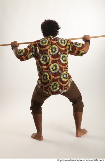 Man Adult Average Black Fighting with spear Standing poses Coat