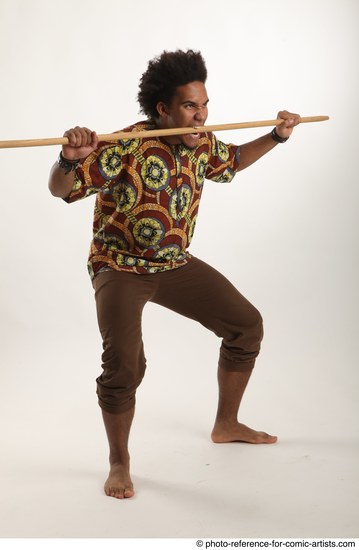 Man Adult Average Black Fighting with spear Standing poses Coat