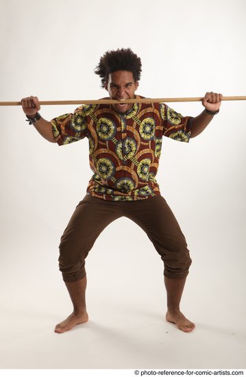 Man Adult Average Black Fighting with spear Standing poses Coat