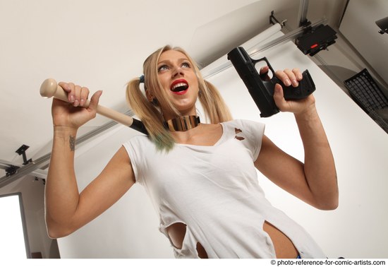 Woman Adult Average White Fighting with gun Standing poses Coat